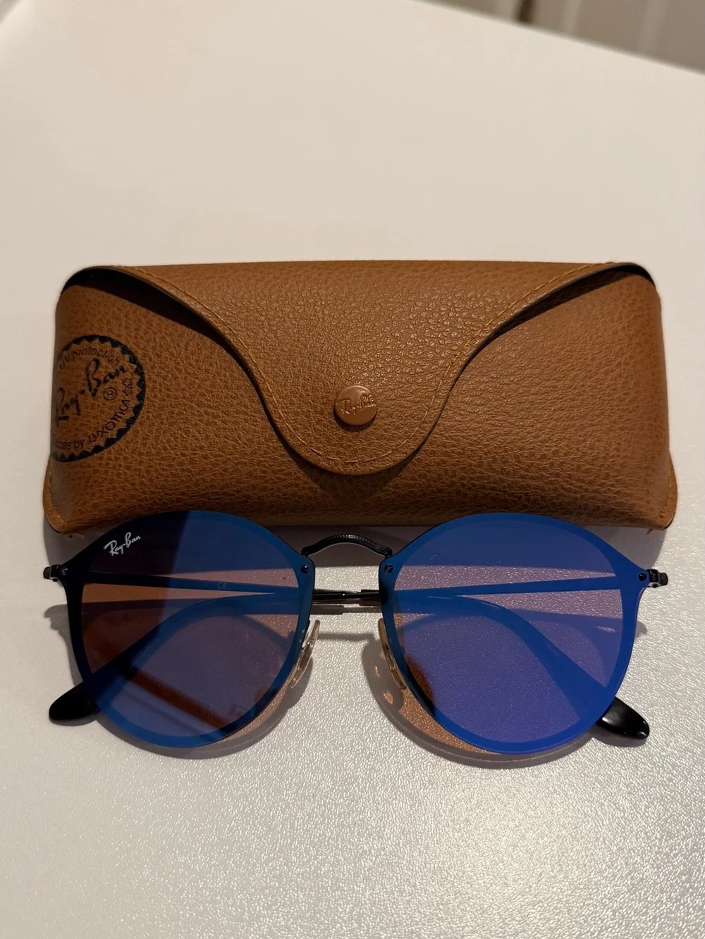 Ray-Ban Black Frame Sunglasses with Blue Lenses and Brown Case